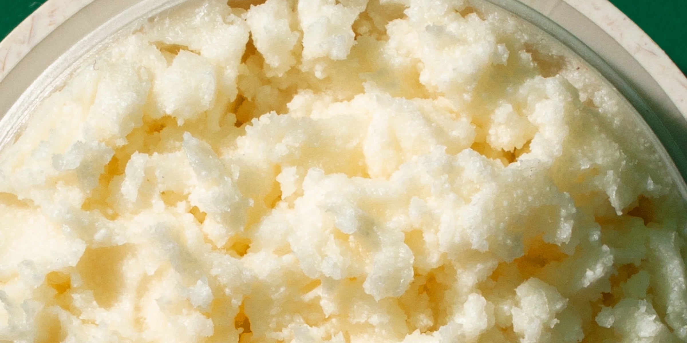 Close-up of whipped tallow in an open Natru jar